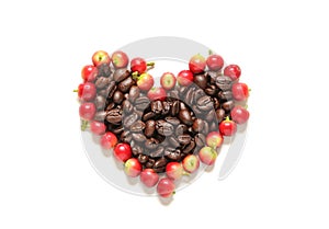 Red coffee beans berries and roasted coffee in heart shape.