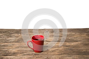 Red coffee cup. Copy space with wood table clean white background