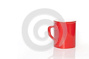 Red coffee-cup on a white background