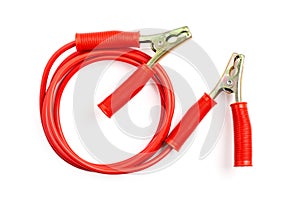 Red color battery extension cable or booster cable isolated on white background