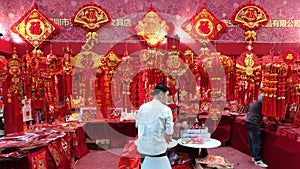 Red color Chinese New Year ornaments at a flower market in Shenzhen.