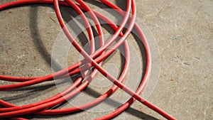 Red color electric power wire cable.