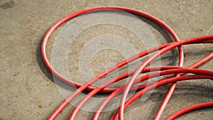 Red color electric power wire cable.