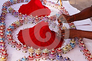 Red color Kumkum or Vermilion for sale in a street in fort kochi India