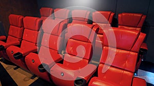 Red color leather movie theater cinema seat chairs.