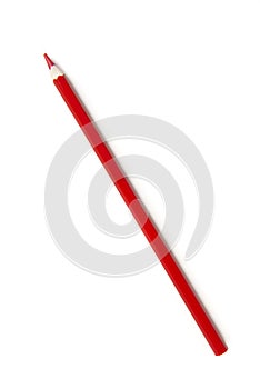 Red color pencil seen from a high angle on a white background