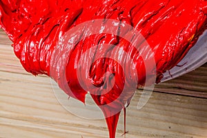 red color of plastisol ink flowed out of the barrel