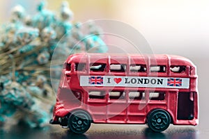 Red color vintage London Bus metal Toy closeup view