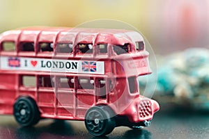 Red color vintage London Bus metal Toy closeup view