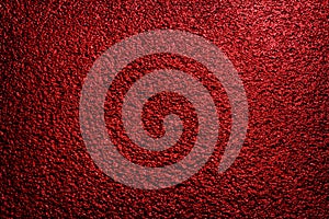 Red colored dark asphalt background