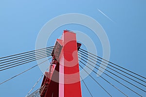 Red colored Willemsbrug over river Nieuwe Maas in Rotterdam, the Netherlands.