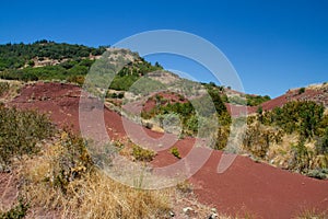 Red coloured geological layers near Lac du Salagou in southern France