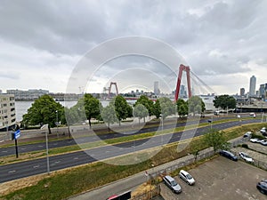 The red coloured Willemsbrug in the city center of Rotterdam