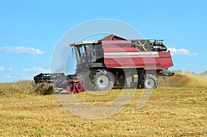 Red combine harvesting