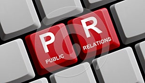 Red Computer keyboard showing PR - Public Relations