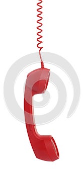 Red corded telephone handset hanging on white background. Hotline concept