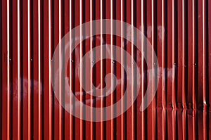 Red corrugated metal sheet.