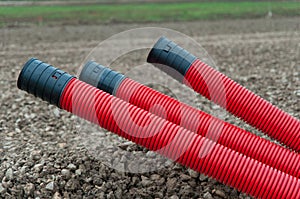 Red corrugated plastic pipes
