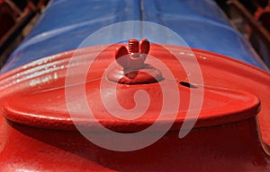 Red cover of the old tractor engine