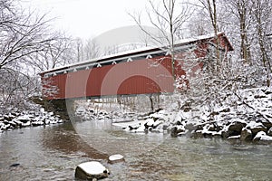 Red covered bridge in a winter wonderland