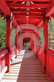 Red Covered Wooden Bridge over the Kaslo River, West Kootenay, British Columbia
