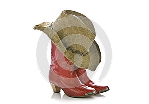 Red cowgirl boots and hat isolated photo