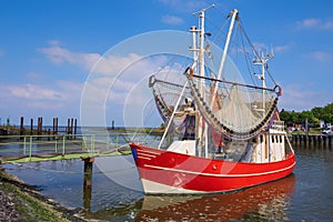 A red crab cutter in the harbor