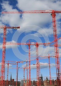 Red cranes on contruction site