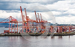 Red Cranes and Shipping Containers