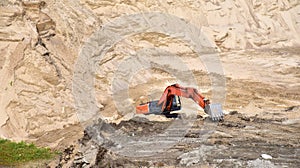 Red Crawler Excavator Works Excavating In A Sandy Mining Quarry