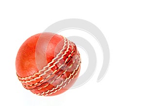 Red cricket ball, isolated