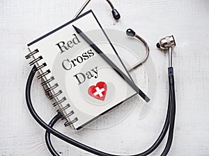 Red Cross Day. Beautiful greeting card. Close-up