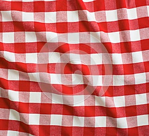Red crumpled linen gingham picnic tablecloth photo