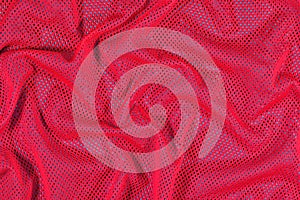 Red crumpled nonwoven fabric background