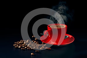 Red cup of hot black coffee with steam and coffee beans on dark background. Low key. Copy space. Coffee break time