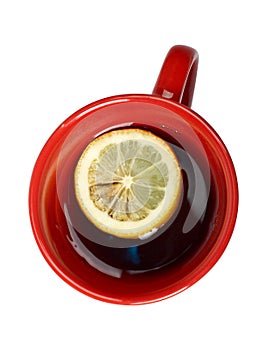 Red cup of tea with lemon