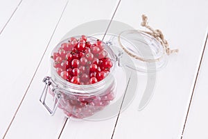 Red currants in a jar