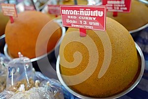 Red curry paste spices selling on Thai market