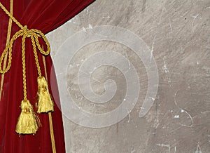 Red curtain with knot and tassel photo