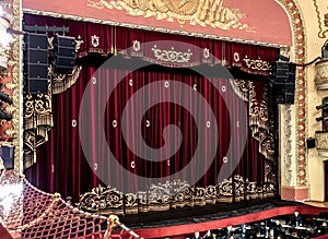 Red curtain on the stage of the opera house