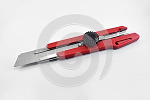Red cutter knife isolated on white background