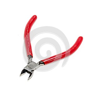 Red cutting plier on white