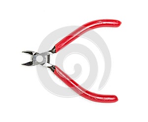 Red cutting plier on white