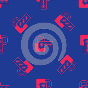 Red Cyber security icon isolated seamless pattern on blue background. Closed padlock on digital circuit board. Safety