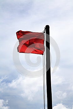 Red danger flag hoisted photo