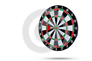 Red dart arrow hitting in the target center is Dart board Isolated on White background