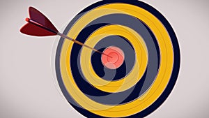 Red dart arrow hitting in the target center of dartboard