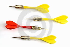 Red dart target on different direction from three yellow dart ta