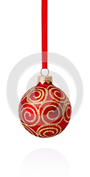 Red decorations Christmas ball hanging on ribbon Isolated on white