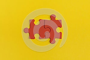 Red details of puzzle on yellow background